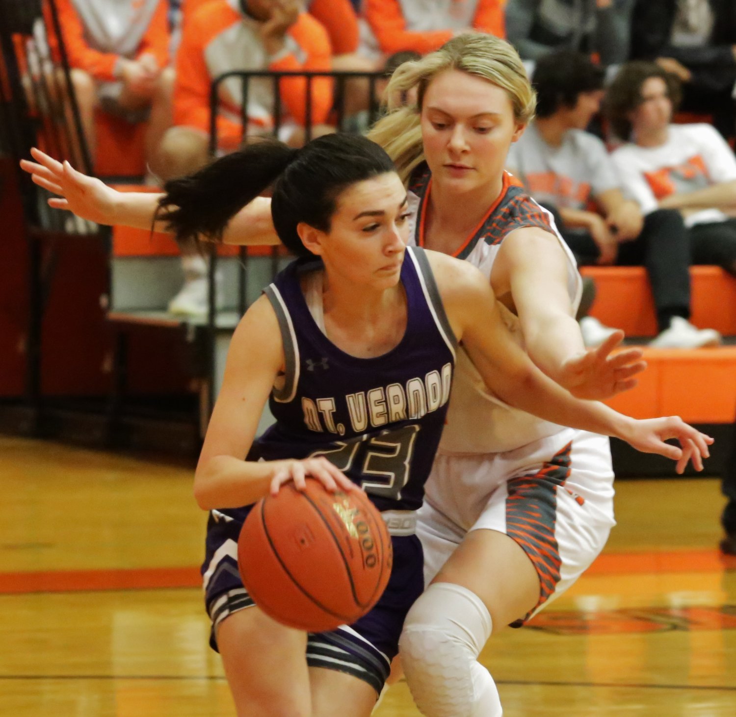 Lady Jacket Ava Johnson presses Mount Vernon in the back court.
